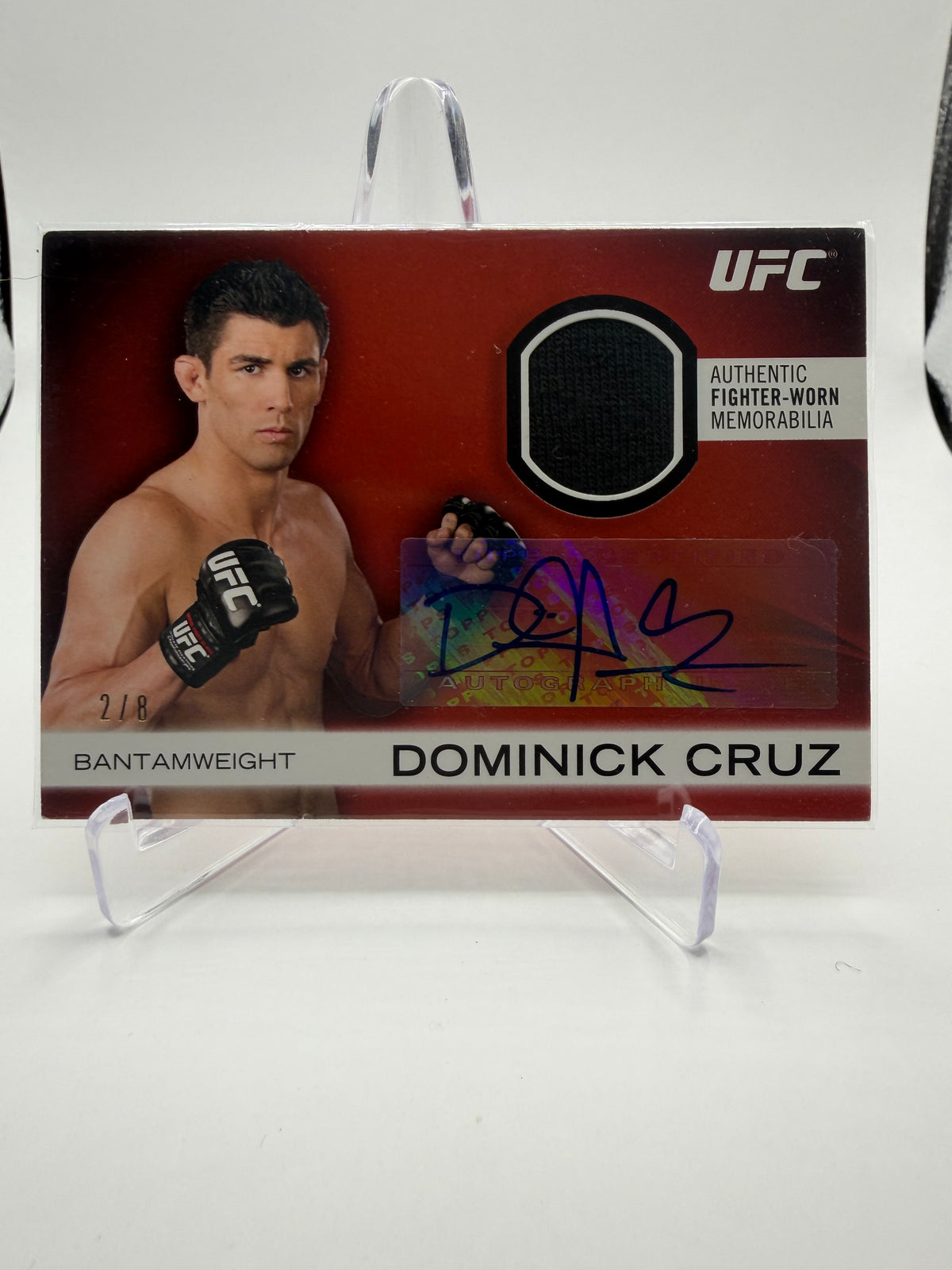 2012 Topps UFC Knockout Dominick Cruz Autographed Fighter Gear Relic Red #AFG-DC /8