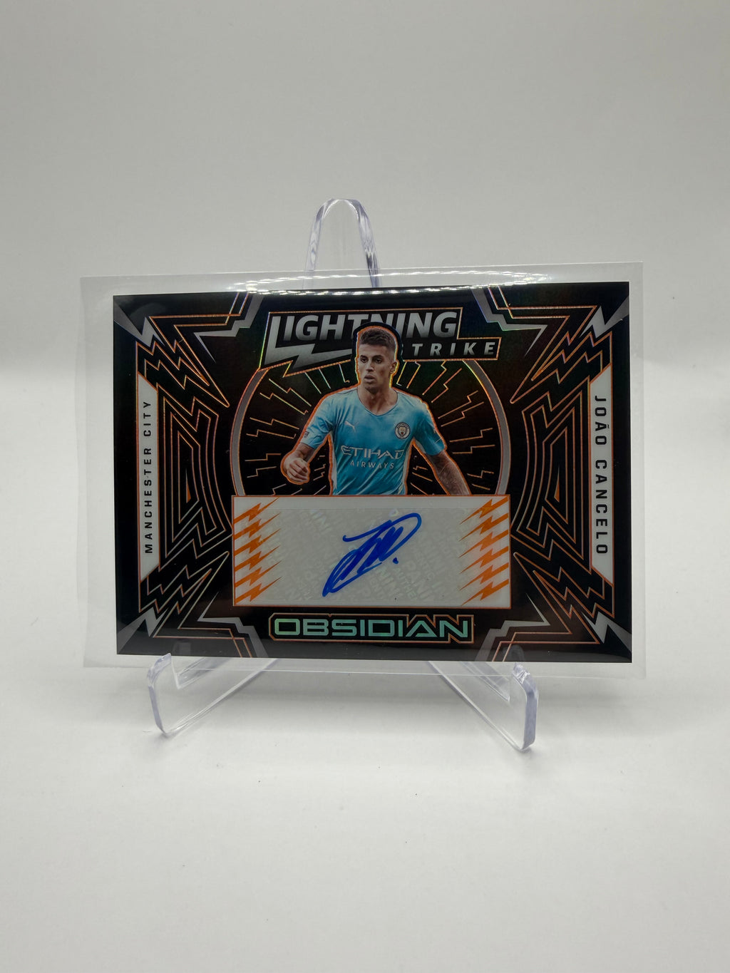 2021-22 Panini Obsidian Soccer Lightning Strike Autographs Electric Etch Orange João Cancelo /30