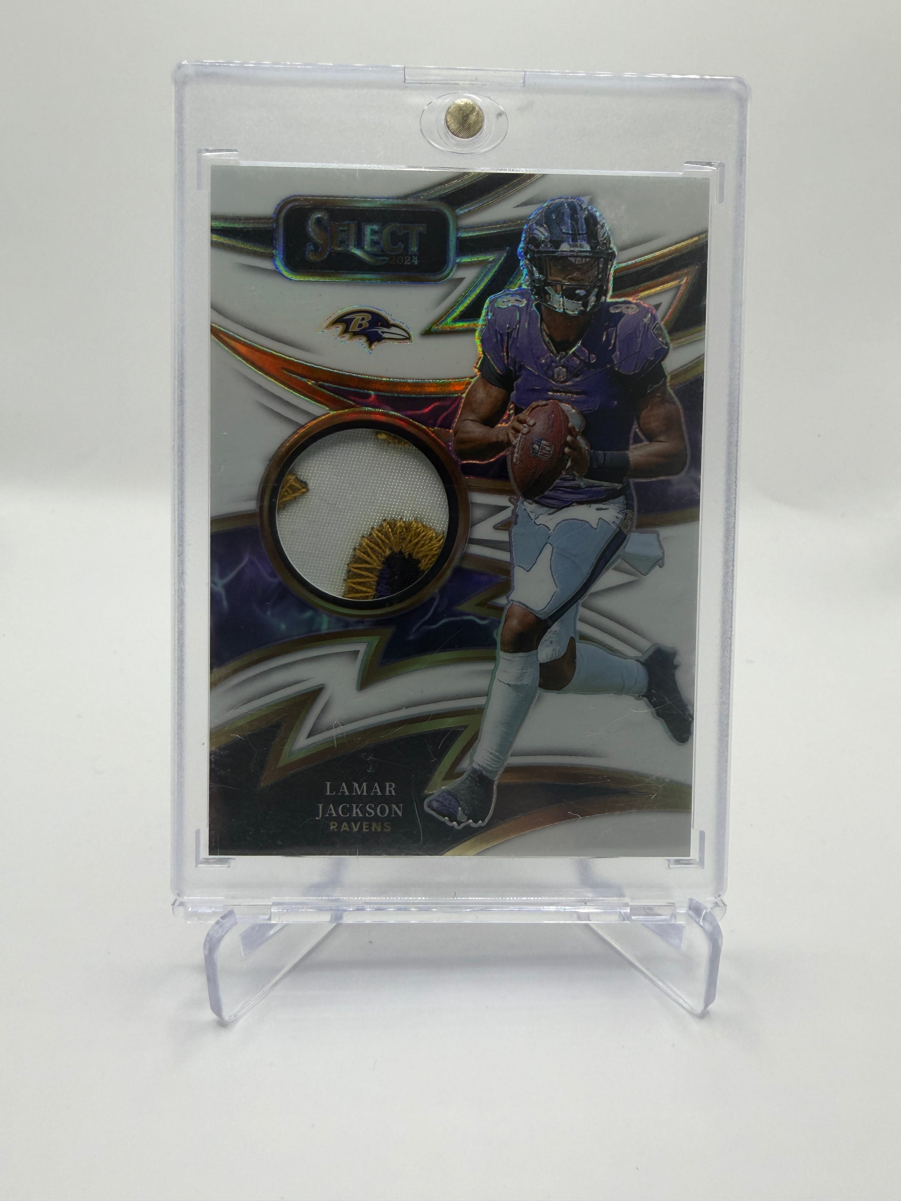 2024 Panini Select Football Sparks Memorabilia Purple Prizm Lamar Jackson #S-LJN /75