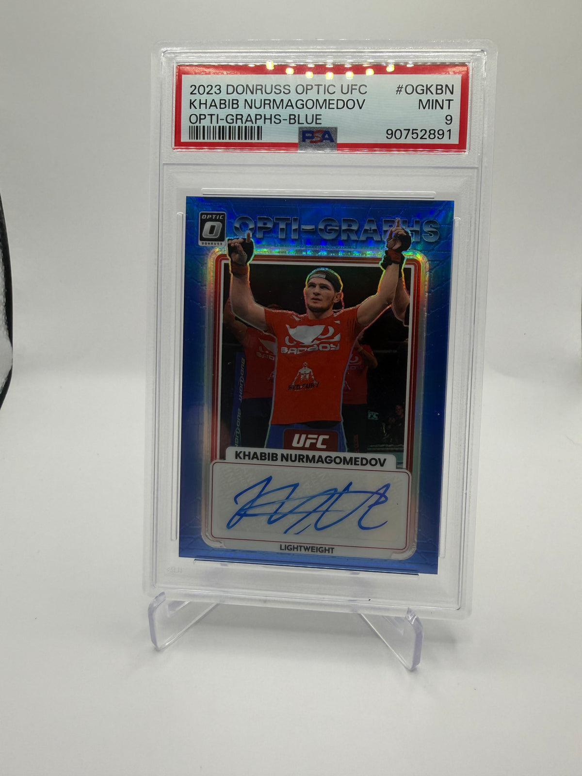 2023 Panini Donruss Optic UFC Khabib Nurmagomedov Opti-Graphs Blue Prizm Auto #OG-KBN /99 PSA 9